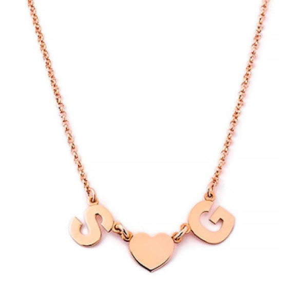 Collana in oro doppia iniziale e cuoricino 415,00 € Home