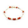 Bracciale bimba in oro e sfere di corallo 108,00 € Bracciali Kids