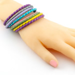 Zoppi jewels|Bracciale etnico in silicone giallo e argento rosa|29,00 €