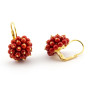 Orecchini a grappolo in oro con corallo 780,00 € Orecchini con gemme