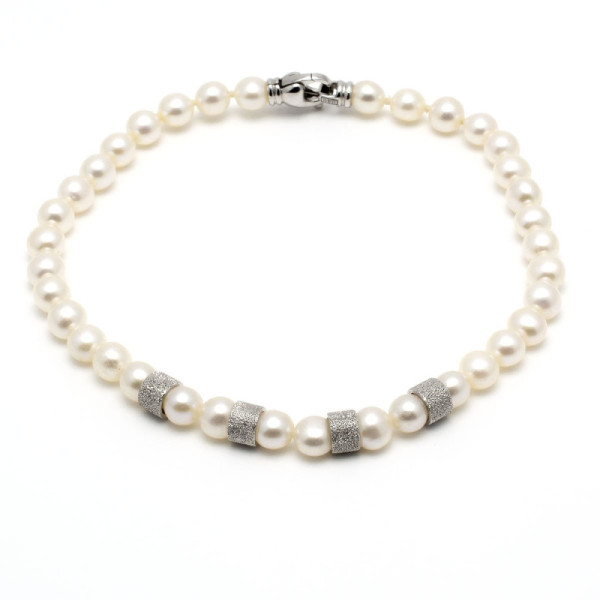 Bracciale di perle 4,5-6 con anelli in oro 290,00 € Bracciali con gemme