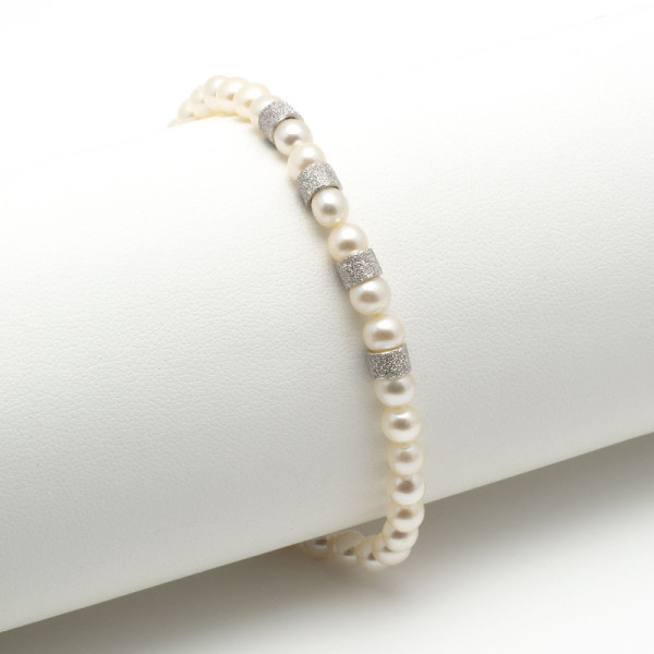 Bracciale di perle 4,5-6 con anelli in oro 290,00 € Bracciali con gemme