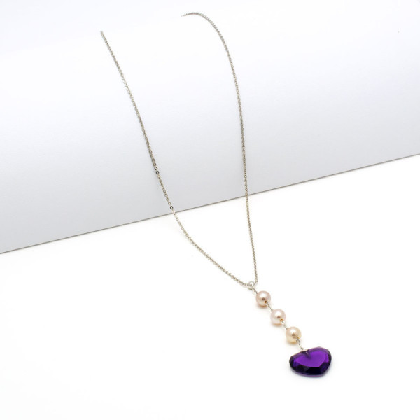 Collana in oro con perle e pietra a cuore 398,00 € Collane con gemme