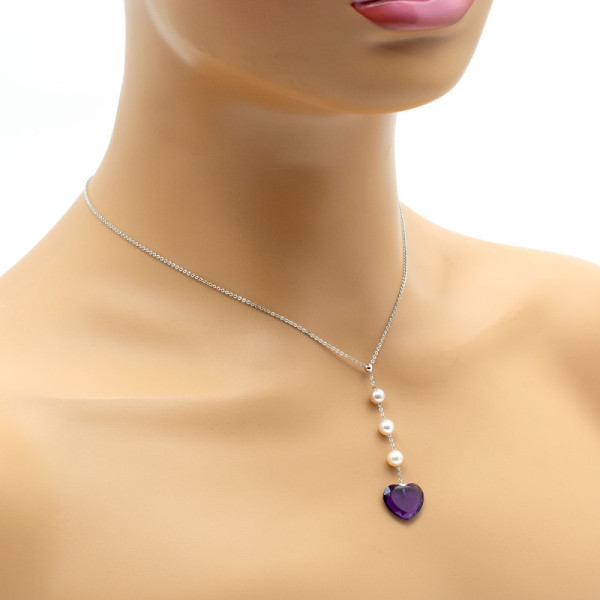 Collana in oro con perle e pietra a cuore 398,00 € Collane con gemme