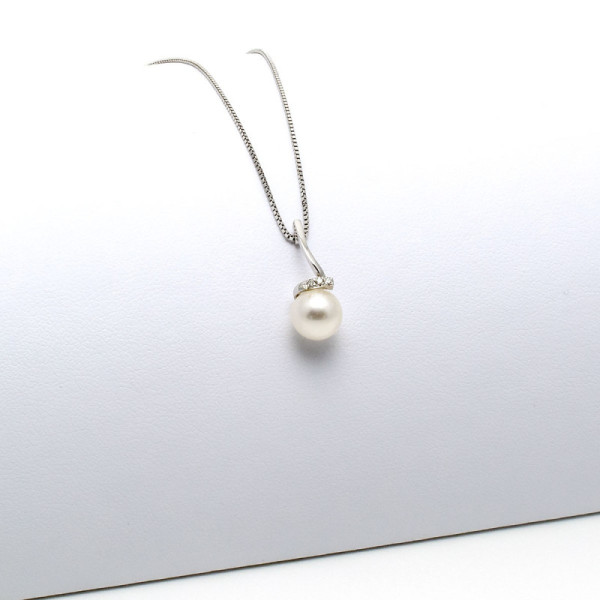 Pendente con perla e diamanti 370,00 € Collane con gemme