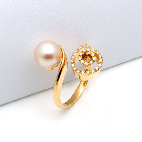 Anello contrariè in oro rosa con perla e diamanti 1,00 € Anelli con gemme