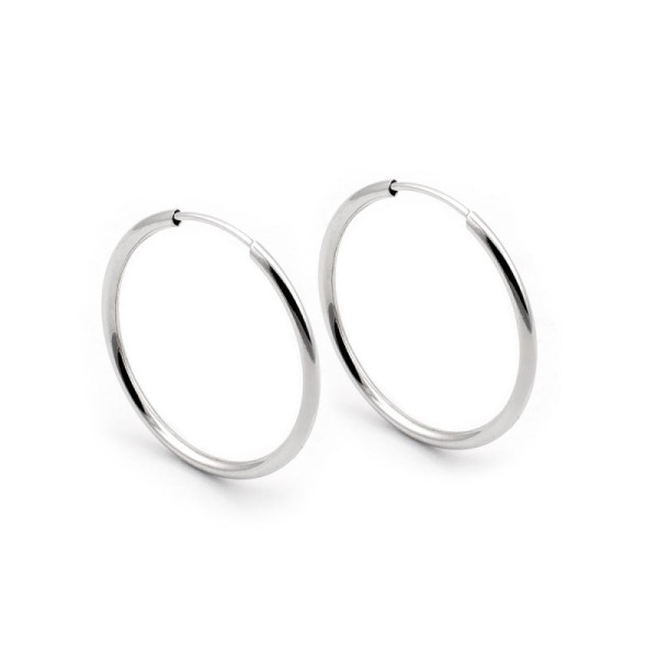 Orecchini cerchio 20mm in oro bianco 84,00 € Orecchini Donna