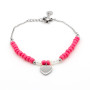 Bracciale con pietre fucsia e cuore pendente in acciaio 13,00 € Bracciali Donna