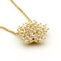 Collana con stella di micro perle in oro 18kt 845,00 € Collane con gemme