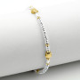 Bracciale in argento a rondelle con fiori dorati 45,00 € Bracciali Donna