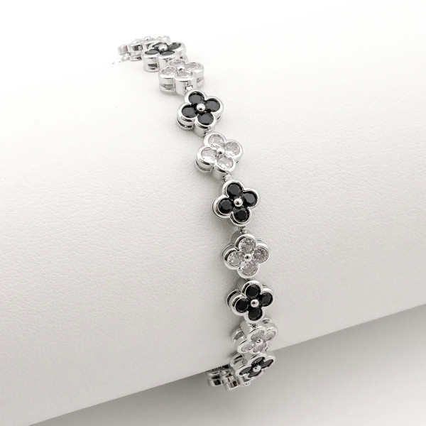 Zoppi Jewels|Bracciale tennis con fiori in acciaio e zirconi bianchi e neri