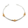 Bracciale in argento a rondelle con coccinelle rosè