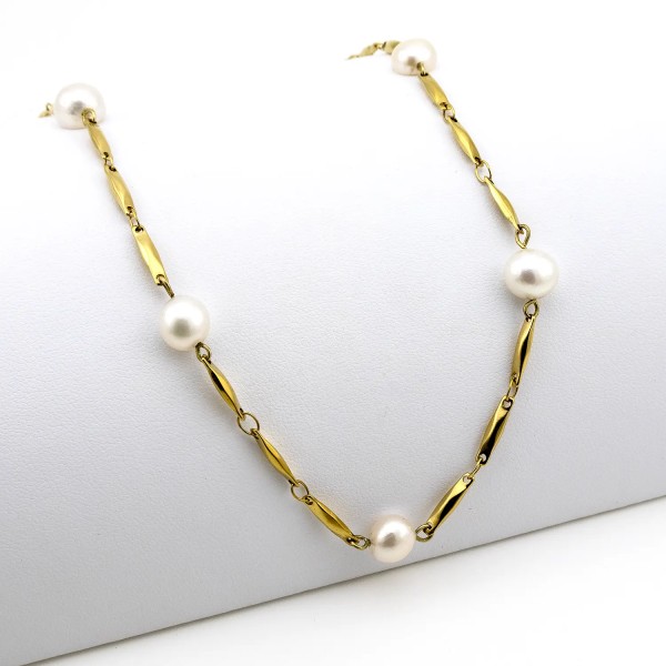 Collana in acciaio dorato e perle d'acqua dolce