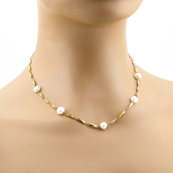 Collana in acciaio dorato e perle d'acqua dolce