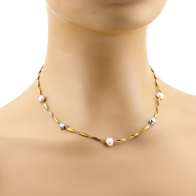 Collana in acciaio dorato con pepite e perle d'acqua dolce