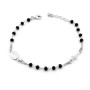 Collana in argento con punto luce a fiore